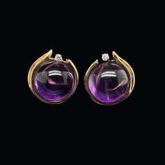 REASONABLE OFFERS CONSIDERED WE ARE RECEPTIVE TO WORKING WITH YOUR BUDGET DURING THIS DIFFICULT TIME. MAKE US AN OFFER AND WE WILL GIVE IT EVERY CONSIDERATION  These striking and Vivid Purple Amethyst Vintage Earrings, crafted in 14K Yellow Gold, feature 20.00ct. Apx. T.W. of Cabochon cut Natural Amethyst Earrings. There are accenting .05ct. Apx. T.W. of Round Brilliant Cut Diamonds with VS1-VS2 clarity and G-H color. The Omega backs (French clips) on these earrings are extremely popular and the French Clip, Amethyst Earrings, Pierced Ears, Round Brilliant Cut Diamond, Purple Amethyst, Brilliant Cut Diamond, Vintage Earrings, Round Brilliant, Ear Piercings