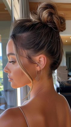 22 Weave Updo Hairstyles That Define Elegance High Bun With Bangs Wedding, Wedding Updo High Bun With Veil, Modern High Updo Hairstyles, Up Do Hairstyles With Bangs, High Bun With Curls Hanging Down, High Bun With Front Pieces Out, High Bun Hairstyles Sleek, High Up Do, Bridal High Updo