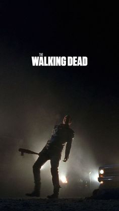 the walking dead movie poster with an image of a man holding a baseball bat in his hand