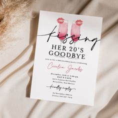 a wedding card with two pink lips on it and the words kissing her 20's goodbye