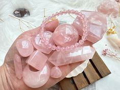 ♡ Gorgeous rose quartz crystal gift set bundle. This listing is for this exact set. ♥ Please note that this set contains mini to small size crystals, please review measurements below. ♥ This set includes rose quartz: bracelet with 6mm beads (7.5 inches in length), free form (43x35x2mm), cube (2mm), moon (35mm), tiny heart (15mm), small flat heart (35mm), mini double terminated point (35mm), small double terminated wand (65mm), and mini tumble (20mm). ♥ Pictures were taken in natural light. While Rose Gold Rose Quartz Crystal Bracelet For Gift, Pink Crystal Bracelet Gift, Rose Quartz Round Crystal Bracelet Gift, Pink Round Crystal Bracelet Gift, Spiritual Pink Crystal Bracelet As Gift, Pink Spiritual Crystal Bracelet For Gifts, Pink Spiritual Crystal Bracelet Gift, Pink Rose Quartz Crystal Bracelet For Gift, Pink Rose Quartz Crystal Bracelet Gift