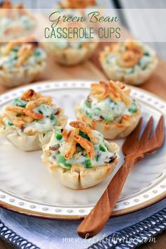 small appetizers are sitting on a white plate