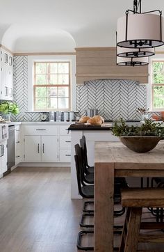 the kitchen is clean and ready to be used as a dining room or family room