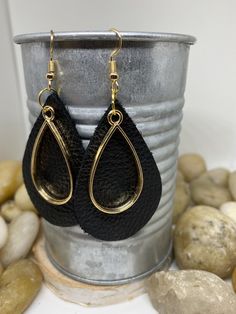 "Beautiful handmade item, real genuine leather earrings, includes a coordinating shape charm in a variety of metals and color options, bronze, silver and gold. Earring colors are black, rich cognac brown weathered leather and camel/mustard. Mustard is silver charm and hook Cognac brown is bronze charm and hook Black is gold charm and hook All available in round or teardrop. Round measures Aprox 1.5\" and teardrop Aprox 2\"" Handmade Black Leather Earrings, Black Leather Everyday Jewelry, Everyday Nickel Free Dangle Earrings, Everyday Use Nickel-free Dangle Earrings, Black Leather Drop Earrings, Nickel-free Gold Earrings For Everyday, Gold Earrings For Everyday Use, Leather Dangle Jewelry For Everyday, Everyday Leather Dangle Jewelry