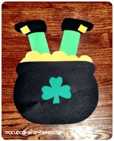 a st patrick's day leprechaun made out of felt and paper