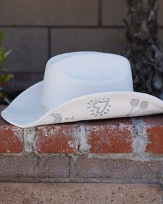 Celebrate in style with our Ivory Rhinestone Studded Disco Cowgirl Hat! This extra cute white cowgirl hat features rhinestone embellishments under the brim. From cherries to hearts, boots and crescent moons, this blingy cowgirl hat may cause compliments at your next concert. Pair with your favorite corset top, shorts and boots for a groovy night out! Denim Dress Outfit, Belt Purse, Cowgirl Hats, Rhinestone Studs, Cardigan Outfits, Bustier Top, Hair Accessories Jewelry, Short Mini Dress, Dress Hats