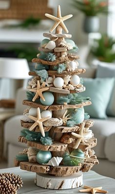 40+ Cozy Coastal Christmas Decor Ideas for a Warm Winter Feel (2024) Starfish Tree Topper, Coral Centerpieces, Beach Christmas Decorations, Coastal Christmas Tree, Coastal Christmas Decor, Mermaid Christmas, Coastal Holiday, Beachy Christmas, Summer Christmas