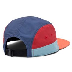 a blue and red hat with an orange visor on the front, two contrasting sides