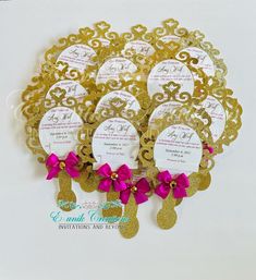 wedding favors with pink bows and gold lace