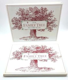 the family tree record book is open to show it's red and white cover