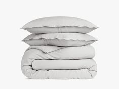 four pillows stacked on top of each other