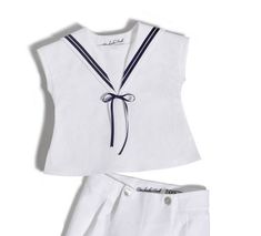 This outfit is for our youngest sailors! Beautiful and very comfortable, made specifically for this age when they spend most of the time sitting down or crawling and playing. This variation consists of a short-sleeve tunic shirt with sailor collar and ribbon details and white bloomer trousers in ¾  length with elastic adjustable flyer waist and cute button cuffs. Material: Italian Linen Also available in blue with white ribbons! Sailor Style Short Sleeve Cotton Top, Summer Sailor Style Short Sleeve Tops, White Marine Style Cotton Tops, Cotton Sailor Top With Sailor Collar, Marine Style Cotton Tops For Summer, Summer Marine Style Cotton Tops, White Short Sleeve School Sets, White Sailor Top For Summer, White Nautical Short Sleeve Tops