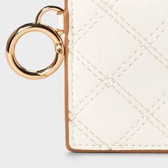 This Large Zip Card Case from A New Day™ in off-white is decorated with a diamond-stitched design for a fashionable, on-trend look. It includes interior and exterior credit card pockets and closes with a zipper to help keep your items nicely contained. Plus, it features an attached ring for connecting to your bag, backpack or keys. A New Day™: Style that goes wherever you do. Modern White Wallet With Rfid Blocking, Modern White Bifold Wallet, White Rfid Blocking Wallets For Everyday, White Rfid Blocking Wallets, White Bifold Wallet With Card Slots, White Rectangular Card Holder With Slots, White Rectangular Card Holder With Card Slots, White Rectangular Card Holder, White Rectangular Coin Purse With Zipper Closure