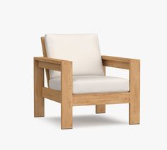 a wooden chair with a white cushion on it's armrest and back rest