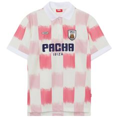 a pink and white polo shirt with the word pacha on it, in front of a