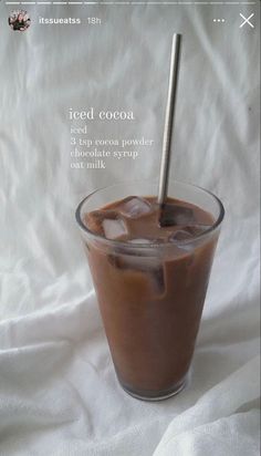 an iced cocoa drink in a glass with a straw