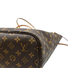 Item Details: Designer: LOUIS VUITTON Retail: N/A Series: Neverfull MM Style: Tote Bag Material: Monogram-coated canvas with leather trim Color: Brown Date Code: Chip Measurements: 12.5" L x 6.5" W x 11.5" H (at sides) Accessories: Wristlet. Condition Detail: Fair - The Item is well-used and may have visible scratches, rubbed corners, darkened leather tanning, and stains. See listing description for details. Outside: Some signs of use. Inside: Dirt, stain marks, ink marks, visible signs of use. Edges: Strong rubbing, dirt mark, signs of use. Canvas: Scuffs, dirt marks, visible signs of use. Leather: Rubbing, dark color, watermarks, wrinkles, visible signs of use. Hardware: Scratches, dirt, signs of use. Straps: Rubbing, dark color, signs of use. Smell: No smell. Please check the details an Business Monogram Canvas Bags, Tan Monogram Canvas Business Bag, Business Tan Monogram Canvas Bag, Formal Monogram Canvas Tote Bag, Formal Tan Monogram Canvas Bag, Classic Gold Signature Coated Canvas Bag, Luxury Tan Bag In Signature Coated Canvas, Luxury Tan Bags In Signature Coated Canvas, Classic Monogram Canvas Pouch Bag