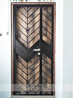 the door is decorated with wooden planks and an arrow design on it's side