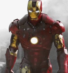 iron man standing in the middle of a city