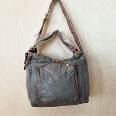 Anthropologie Manzanilla Hobo Bag By Schuler & Sons Philadelphia. Buttery Soft Grey Textured Genuine Leather (The Stock Photos Show An Olive Color Bag, The Bag For Sale Is Grey) Adjustable Strap One Outer, Three Inner Pockets Magnetic Snap Closure Leather, Cotton Lining Approx Measurements: 9'h, 10"W, 5"D 15" Strap Drop **Nwot** Taupe Travel Shoulder Bag, Taupe Tote Bucket Bag, Everyday Taupe Tote Bucket Bag, Taupe Shoulder Bag With Removable Pouch For Travel, Taupe Hobo Tote Bag With Removable Pouch, Taupe Tote Satchel With Handles, Taupe Hobo Bag With Adjustable Strap, Taupe Tote Shoulder Bag For Everyday Use, Taupe Tote Satchel