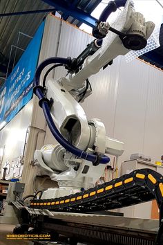 a robot is moving along the conveyor belt