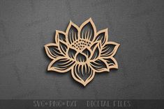 a wooden cutout of a lotus flower