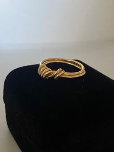 A beautiful thick buttery gold wire wrapped ring Twisted Gold Ring For Gift, Elegant Gold Hand Wrapped Rings, 14k Gold Wire-wrapped Rings, Wire Wrapped 14k Gold Rings, Gold Minimalist Wire Wrapped Stackable Rings, Elegant Everyday Wire Wrapped Rings, Minimalist Gold Wire Wrapped Stackable Rings, Gold Wire Wrapped Open Ring, Everyday Gold Wire Wrapped Rings