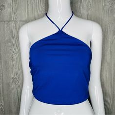 Nwt Princess Polly Nield Top Blue Halter Strap Style 6 Summer Top Beach Nightout Solid Color Summer Halter Top For Night Out, Solid Halter Top For Summer Night Out, Blue Stretch Halter Top, Blue Stretch Sleeveless Halter Top, Fitted Blue Halter Top For Summer, Blue Halter Neck Tank Top For Vacation, Summer Blue Halter Top For Day Out, Summer Date Night Cami Halter Top, Blue Crop Top For Summer Party