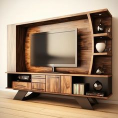 an entertainment center with a large television on it's side and shelves in the middle