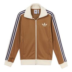 This Men's adidas originals Brand Logo Printing Zipper Classic Sports Jacket is the perfect addition to your wardrobe. It's designed to keep you comfortable and stylish during any activity. The classic silhouette and bold branding make it stand out from the crowd. The jacket is made with a lightweight fabric that is breathable and comfortable. The zipper closure ensures a secure fit and the adjustable drawstring waistband allows you to customize your look. The jacket is part of the adidas originals series, inspired by classic sportswear and streetwear. It's the perfect jacket for any occasion and is sure to make a statement. (Stripe) Adidas Sporty Track Jacket With Logo, Sporty Adidas Track Jacket, Fall Athleisure Outerwear With Side Stripes, Sporty Outerwear With Side Stripes For Fall, Sporty Fall Outerwear With Side Stripes, Athleisure Outerwear With Side Stripes For Streetwear, Athleisure Outerwear With Side Stripes For Sports, Adidas Sporty Streetwear Track Jacket, Adidas Athleisure Outerwear For Sports Season