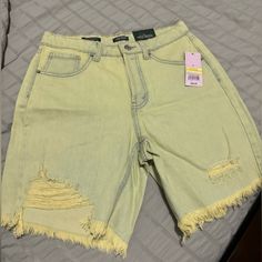 Denim Wild Fable Shorts; Yellow Tint Of Green, Torn Style Spring Green Denim Jean Shorts, Green Denim Jean Shorts For Spring, Green Jeans With Frayed Hem For Summer, Yellow Straight Leg Denim Bottoms, Spring Green Bottoms With Frayed Hem, Trendy Yellow Cutoff Shorts, Yellow Casual Jean Shorts For Spring, High Waist Yellow Denim Jean Shorts, High-waisted Yellow Denim Jean Shorts