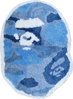 a blue and white rug with an animal on it