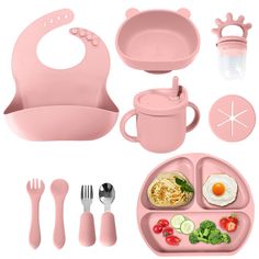 a pink baby feeding set with utensils and food