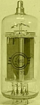 an old fashioned radio with a glass case on the front and side, in black and white