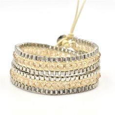 Champagne Crystals on Ivory Leather Wrap Bracelet Elegant Leather Bracelet For Party, Luxury Adjustable Beaded Bracelets For Party, Elegant Gold Metal Wrap Bracelet, Adjustable Elegant Leather Bracelet For Party, Adjustable Cream Jewelry For Parties, Adjustable Gold Leather Bracelet For Party, Elegant Beige Bracelets, Elegant Silver Wrap Bracelet For Party, Elegant Beige Metal Jewelry