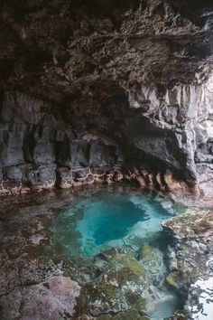 the water is blue and clear in this cave