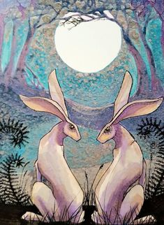 two rabbits sitting next to each other in front of a full moon and some trees