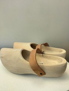 Hand Made Wooden Shoes Casual Wood Mules With Round Toe, Wooden Slip-on Mules, Casual Wood Closed Toe Clogs, Casual Closed Toe Wooden Clogs, Spring Slip-on Clogs With Rubber Heel Cap, Wooden Mules With Rubber Sole And Round Toe, Casual Closed Toe Clogs With Rubber Heel Cap, Leather Closed Toe Clogs, Wooden Clogs With Round Toe