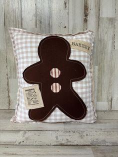 a pillow with a brown ginger on it