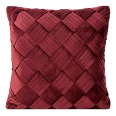 a red pillow with woven squares on the front and back, sitting on a white background