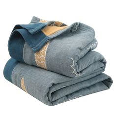 three folded towels stacked on top of each other