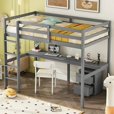 a loft bed with desk underneath it in a child's bedroom or playroom