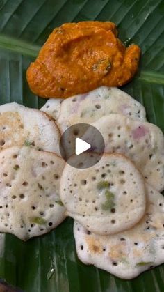 some food is sitting on top of a green leaf