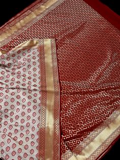 Beige Color Banarasi Semi Tussar Silk Saree with Red Borders and Pallu with Antique Zari Weaved Floral Buttas and tiny buttas on the body of the Saree with Grand Borders and Pallu. Very Soft Saree. Item : SareeColor : Beige GoldBase Fabric : Banarasi Semi-Tussar Blouse piece : YesBlouse material : Semi-Tussar blend Ghicha Work : Handloom, Tassels attachedFall & Edging(Pico) Done (Yes/No) : Yes Disclaimer -:- Color variation is possible due to various reasons like phone or desktop setting, resolu Silk Meenakari Sets For Eid, Eid Silk Sets With Meenakari Details, Elegant Zari Weaving Sharara For Festive Season, Elegant Festive Sharara With Zari Weaving, Elegant Banarasi Silk Meenakari Sets, Elegant Meenakari Banarasi Silk Sets, Diwali Raw Silk Meenakari Sets, Elegant Anarkali Set With Zari Weaving In Dola Silk, Celebration Art Silk Saree With Meenakari