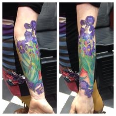 a woman's arm with purple flowers on it