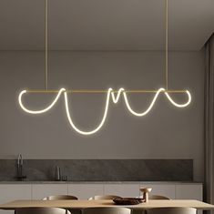 a dining room table and chairs with lights hanging from the ceiling above it in a modern style