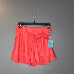 Nwt, No Stains Or Tears, Perfect Condition, Ruffled Bottom With Matching Belt Detail, Size 2 Length: 15 In Inseam: 5 In Waist: 16 In Flowy Tiered Bottoms For Beach, Flowy Tiered Beach Bottoms, Summer Ruffled Shorts For Brunch, Flowy Tiered Summer Bottoms, Summer Brunch Shorts With Ruffles, Summer Vacation Shorts With Ruffles, Summer Ruffle Shorts For Brunch, Summer Tiered Bottoms For Vacation, Flirty Ruffled Shorts For Vacation