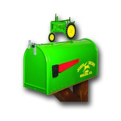 a green mailbox with a tractor on it