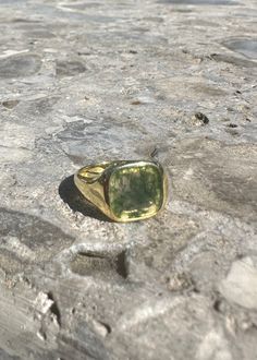 Here we have a lovely timeless 18K gold Signet Ring / pinky ring with a green zircon stone, its 11.5mm in height and 3.2mm in thickness, it has a smoothed edge for maximum comfort. The edge thickness is 1.3mm and sits perfect one the finger to reduce the chances of catching on anything in your day to day life. I have included the diagram to give customers a good understanding of the full dimensions. This is finish product and is ready for dispatch on Express Fedex delivery Classic Green Open Signet Ring, Modern Green Signet Ring With Polished Finish, Green 14k Gold Signet Ring With Bezel Setting, Heirloom Style Green Emerald Ring With Polished Finish, Heirloom Style Polished Emerald Ring, Green Signet Ring With Bezel Setting For Gift, Classic Green Rings For Everyday Wear, Luxury Green Rings With Vs Clarity, Classic Green Rings For Everyday