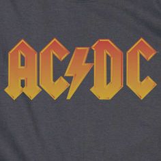 an ac / dc t - shirt with the word ac / dc printed on it